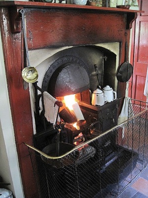 Iron range with kettle, ladle